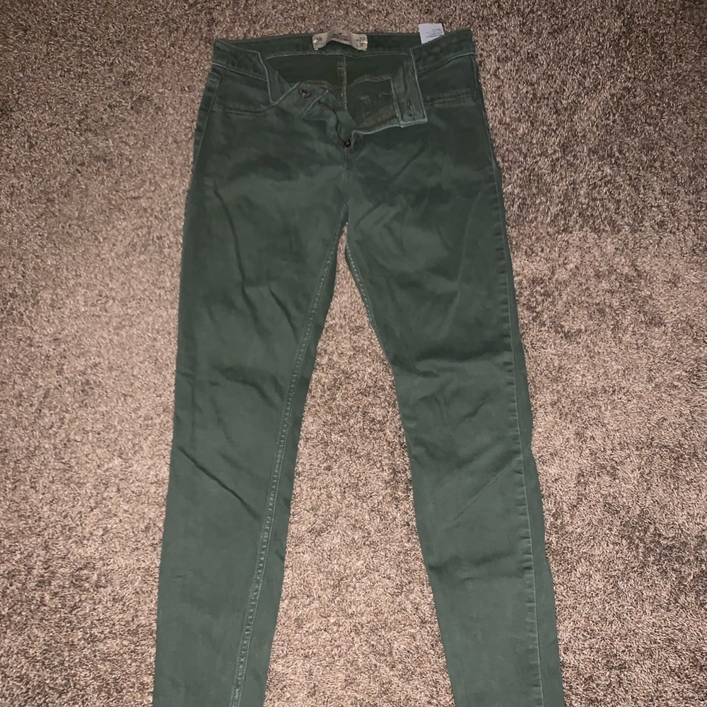 Green Hollister skinny jeans